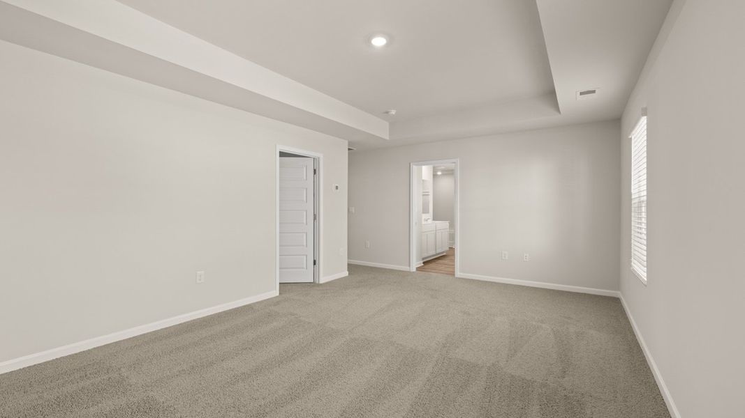Spacious, unfurnished interior of a new home in The Reserve at Calcutta, Stockbridge (Image 18).