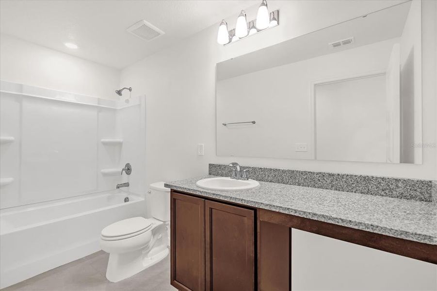 Furnished interior view inside a new home in Robins Run, Lake Wales (Image 7).