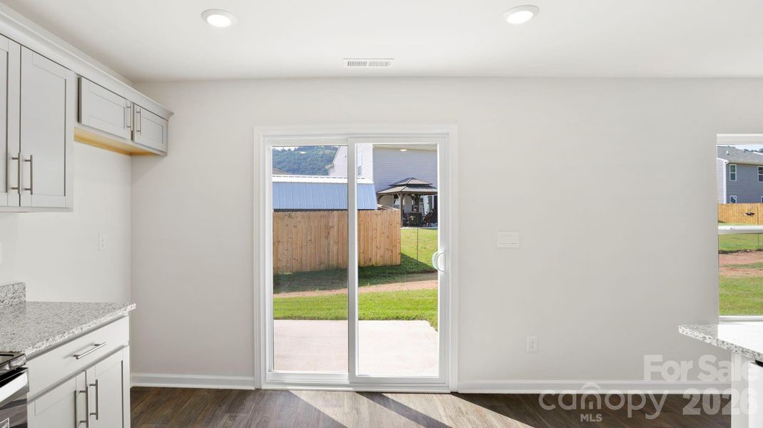 Spacious, unfurnished interior of a new home in Wildbrook Village, Waynesville (Image 24).