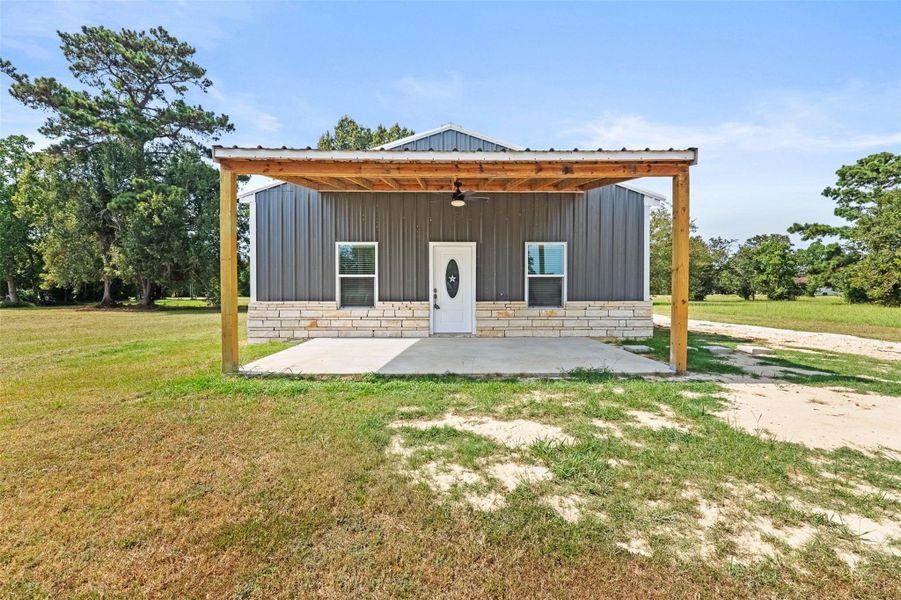 Exterior details and patio area of a home in , Point Blank (Image 21).