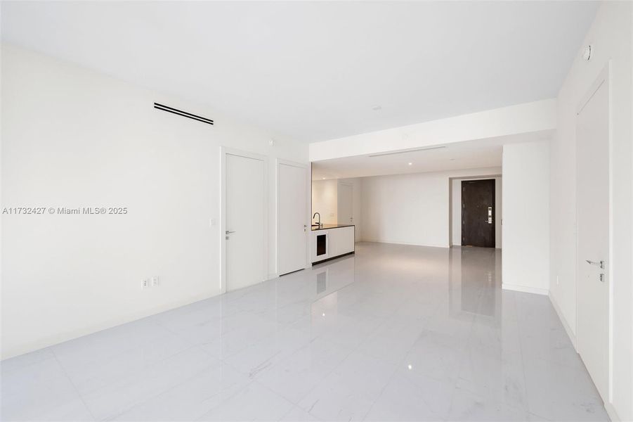 Spacious, unfurnished interior of a new home in Aston Martin Residences, Miami (Image 11). Spacious, unfurnished interior of a new home in Aston Martin Residences, Miami (Image 11).
