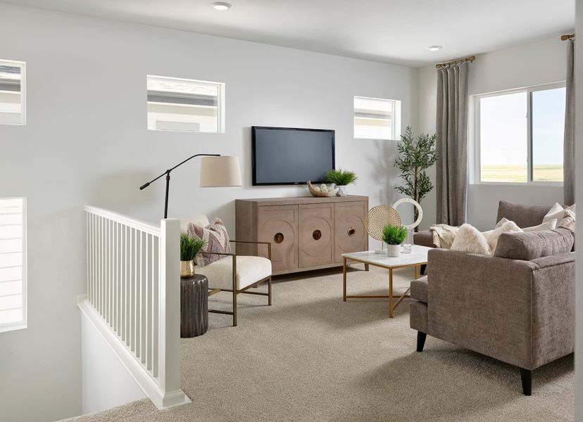 Furnished interior view inside a new home in The Aurora Highlands, Aurora (Image 7).