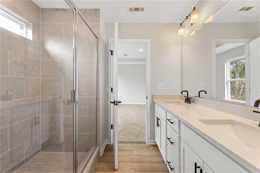 Furnished interior view inside a new home in The Bluffs, Canton (Image 13). Furnished interior view inside a new home in The Bluffs, Canton (Image 13).