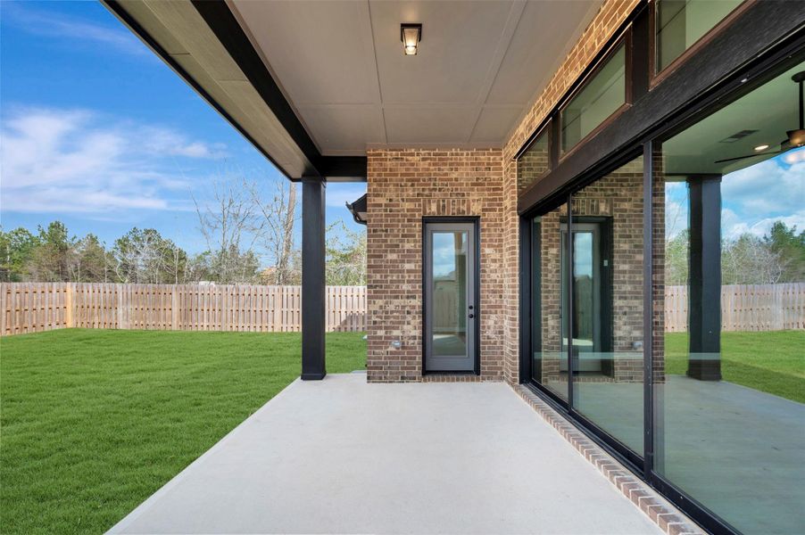 Exterior details and patio area of a home in COLTON - Reserve Collection, Todd Mission (Image 4).
