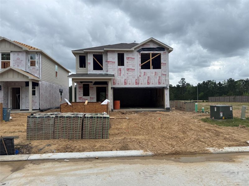 In-progress construction of a new home in The Lakes at Black Oak Villas, Magnolia, TX (Image 20). In-progress construction of a new home in The Lakes at Black Oak Villas, Magnolia, TX (Image 20).