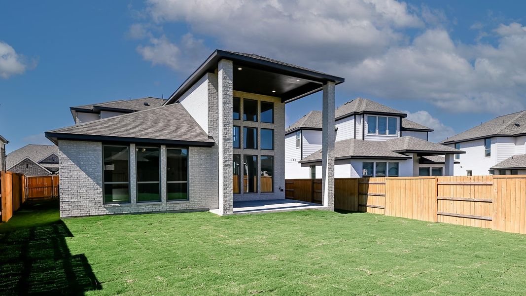 Exterior details and patio area of a home in 6 Creeks 50', Kyle (Image 19).