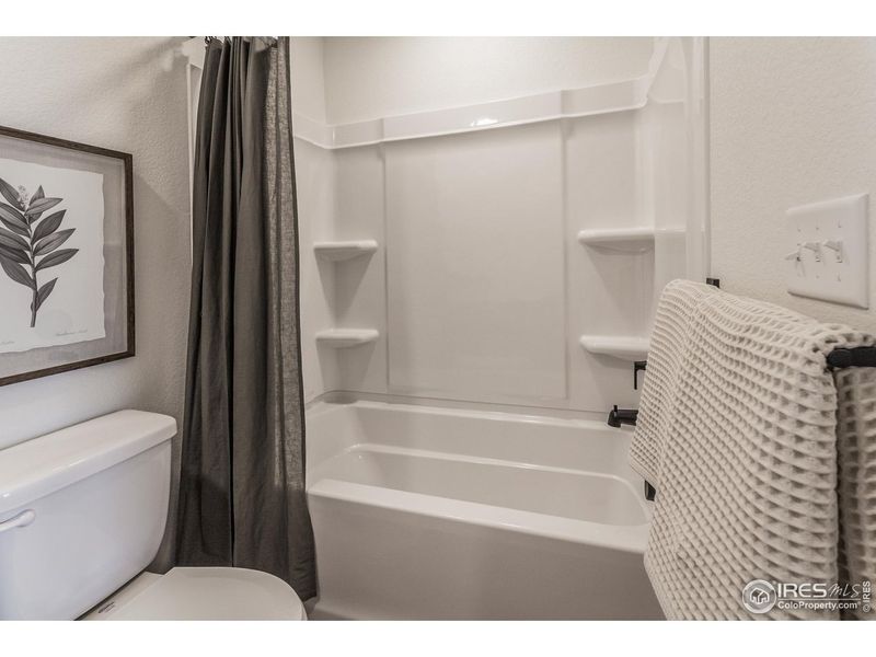 Furnished interior view inside a new home in Prairie Song Story Collection - Single Family Homes, Windsor (Image 26).