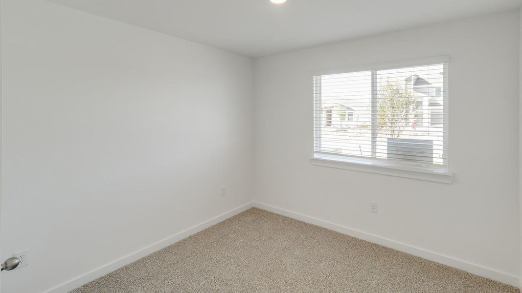 Spacious, unfurnished interior of a new home in Trails at Wildhorse, Austin (Image 9).