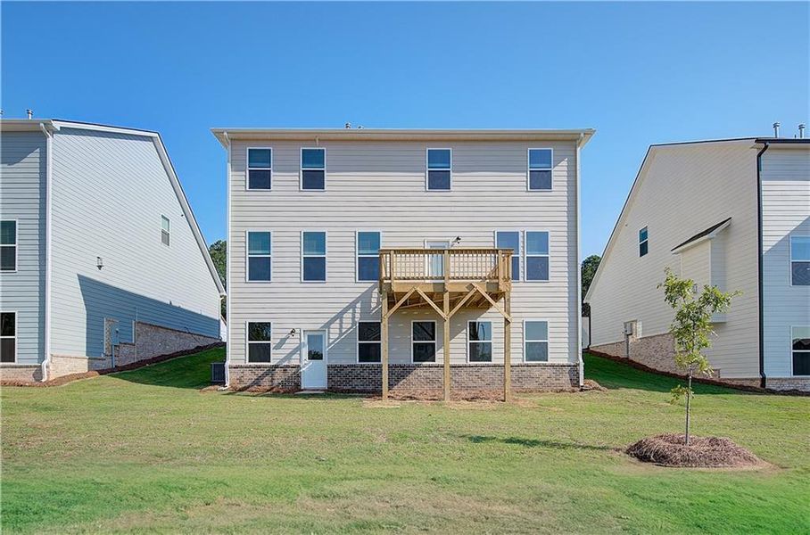 Front exterior of a new home in Cooper Park, McDonough, GA, highlighting curb appeal (Image 17).