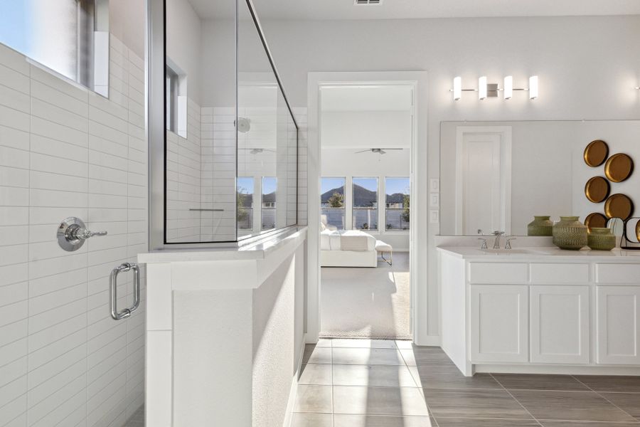 Primary Bathroom in the Monet II home plan by Trophy Signature Homes – REPRESENTATIVE PHOTO