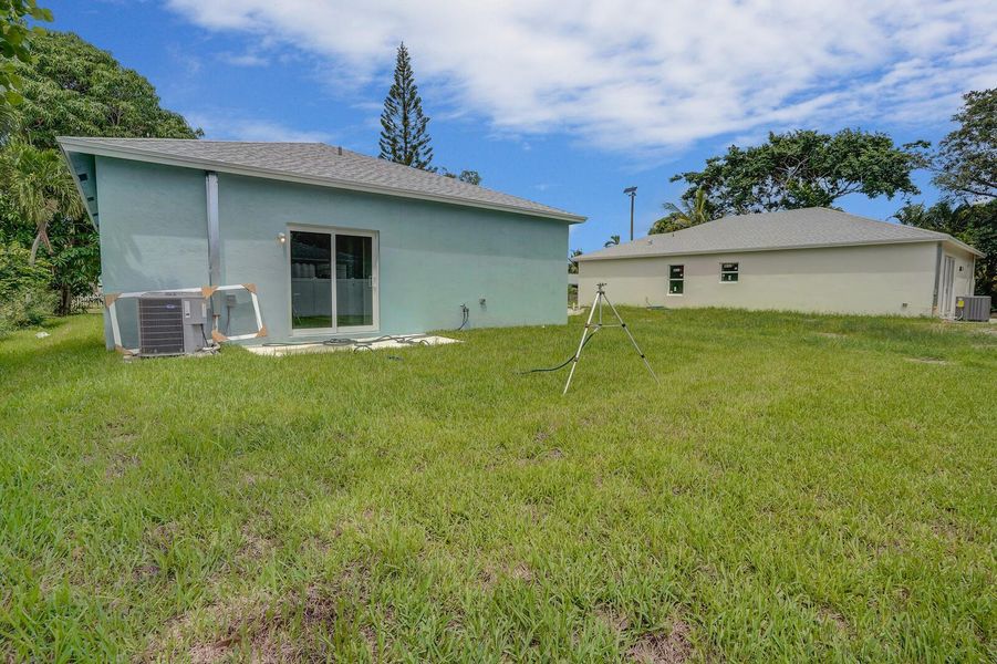 Front exterior of a new home in , Lantana, FL, highlighting curb appeal (Image 14). Front exterior of a new home in , Lantana, FL, highlighting curb appeal (Image 14).