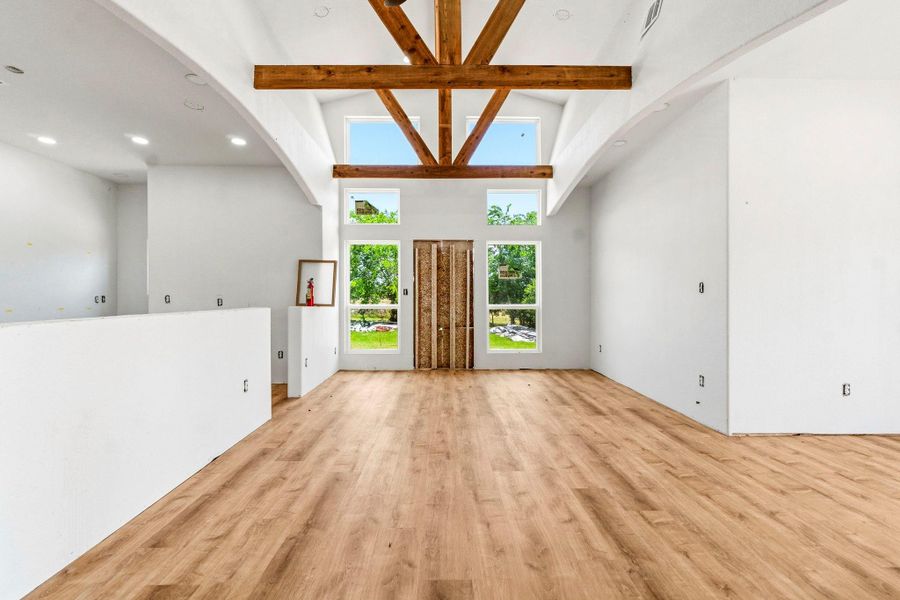 Kitchen is open to the gorgeous dining/breakfast room lined in windows.