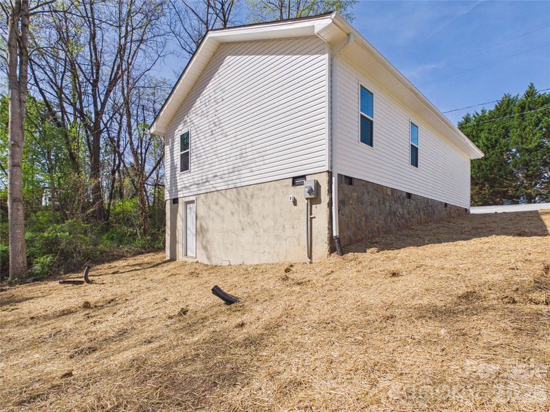 Exterior details and patio area of a home in , Valdese (Image 26).
