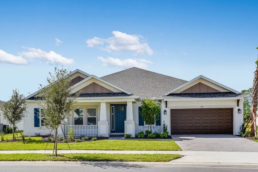 Representative exterior photo of a completed home built from the Abaco by Taylor Morrison in Ardisia Park, New Smyrna Beach, FL (Image 1).