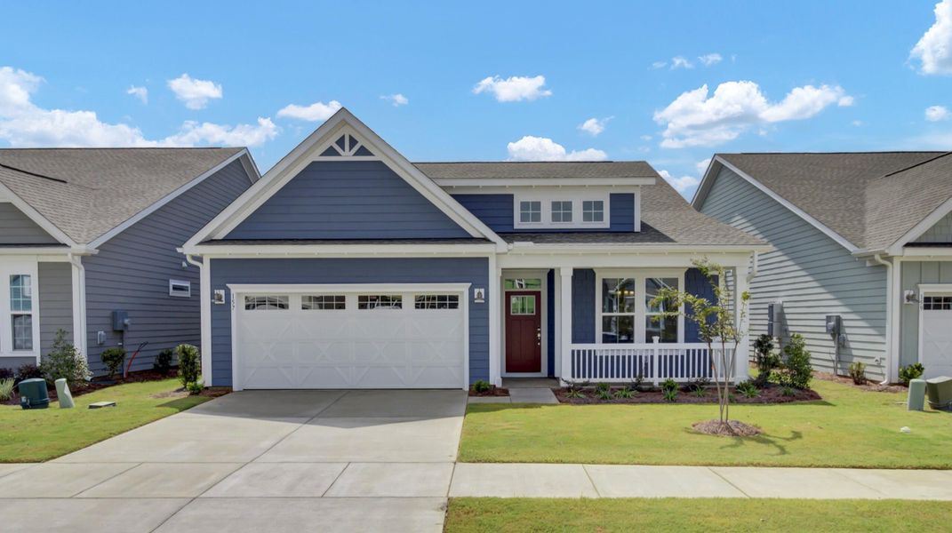 Front exterior of a new home in Cresswind Charleston, Summerville, SC, highlighting curb appeal (Image 18).