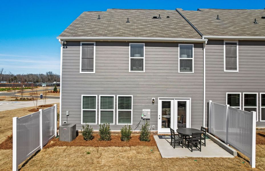 Exterior details and patio area of a home in Riverstone, Monroe (Image 4). Exterior details and patio area of a home in Riverstone, Monroe (Image 4).