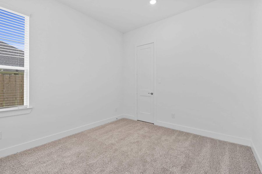 Spacious, unfurnished interior of a new home in Attwater 55s, Waller (Image 38).