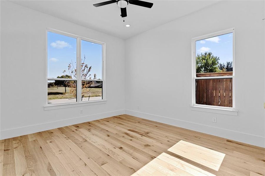 2nd bedroom located on the 1st floor with light wood finished floors and recessed lighting. Can be used as a mother-in-law-suite 2nd bedroom located on the 1st floor with light wood finished floors and recessed lighting. Can be used as a mother-in-law-suite