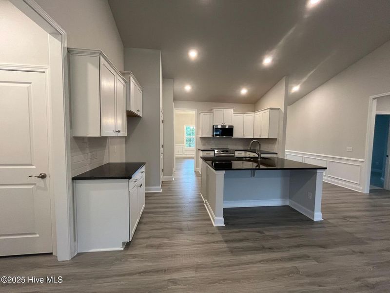 Furnished interior view inside a new home in Palmetto Creek, Bolivia (Image 5).