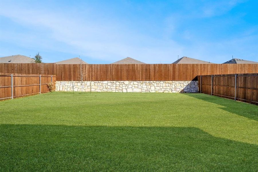 Exterior details and patio area of a home in Northlake Estates, Little Elm (Image 26). Exterior details and patio area of a home in Northlake Estates, Little Elm (Image 26).