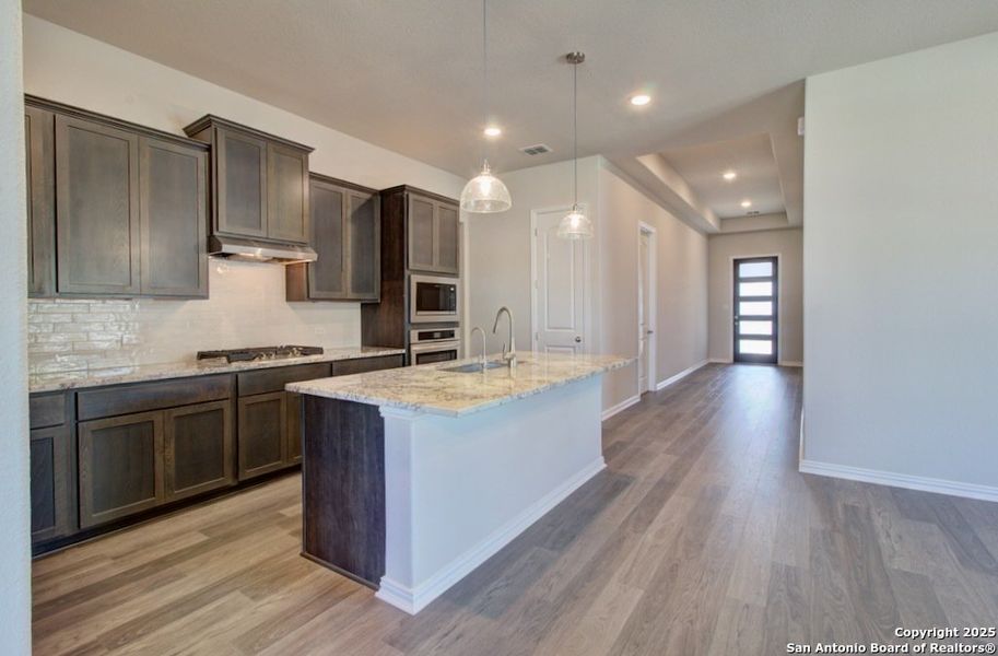 Furnished interior view inside a new home in The Crossvine, Schertz (Image 8).