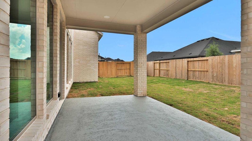 Exterior details and patio area of a home in Cross Creek West, Fulshear (Image 3).