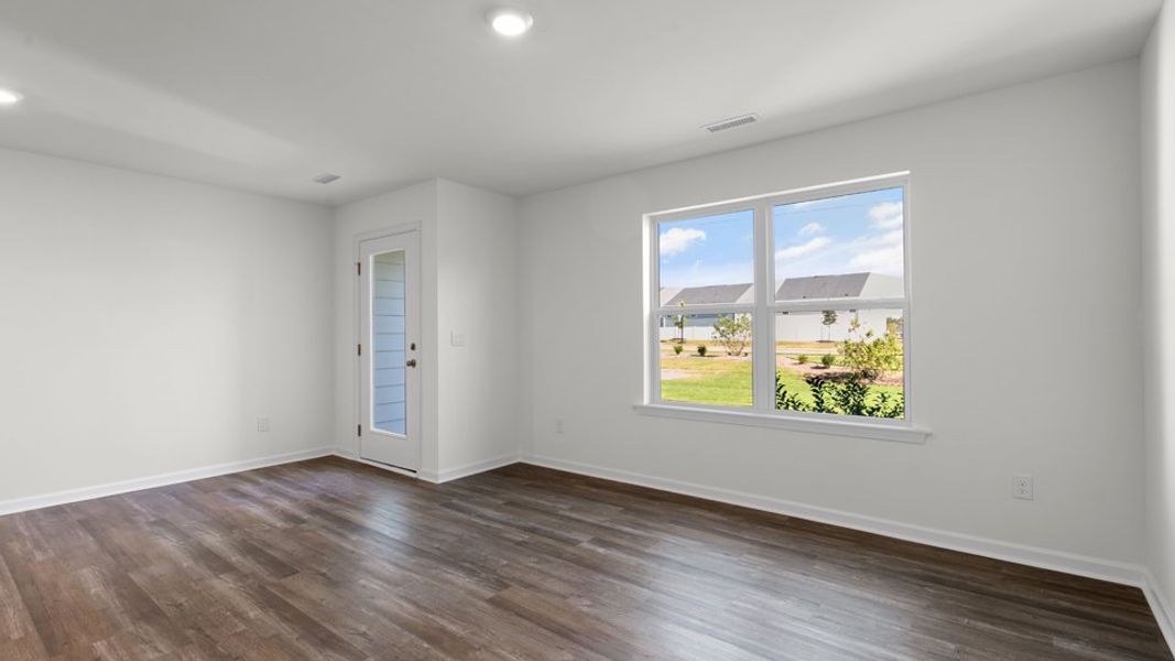 Spacious, unfurnished interior of a new home in The Townes at Belle Grove, Wendell (Image 16).