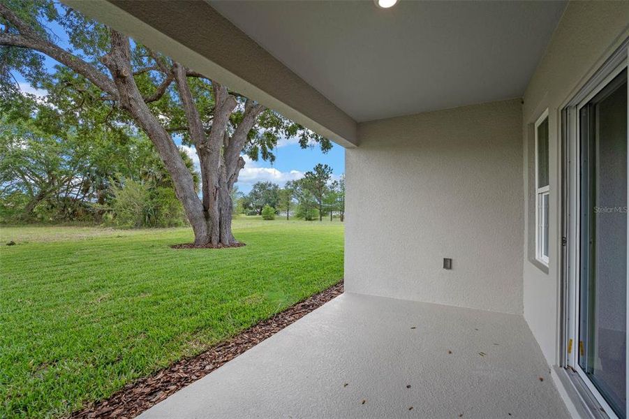 Exterior details and patio area of a home in Fountain View, Ormond Beach (Image 3).