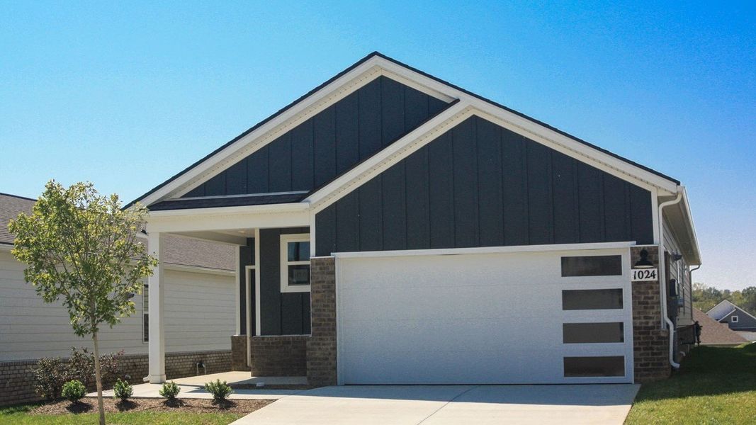 Front exterior of a new home in Nexus South, Gallatin, TN, highlighting curb appeal (Image 2). Front exterior of a new home in Nexus South, Gallatin, TN, highlighting curb appeal (Image 2).