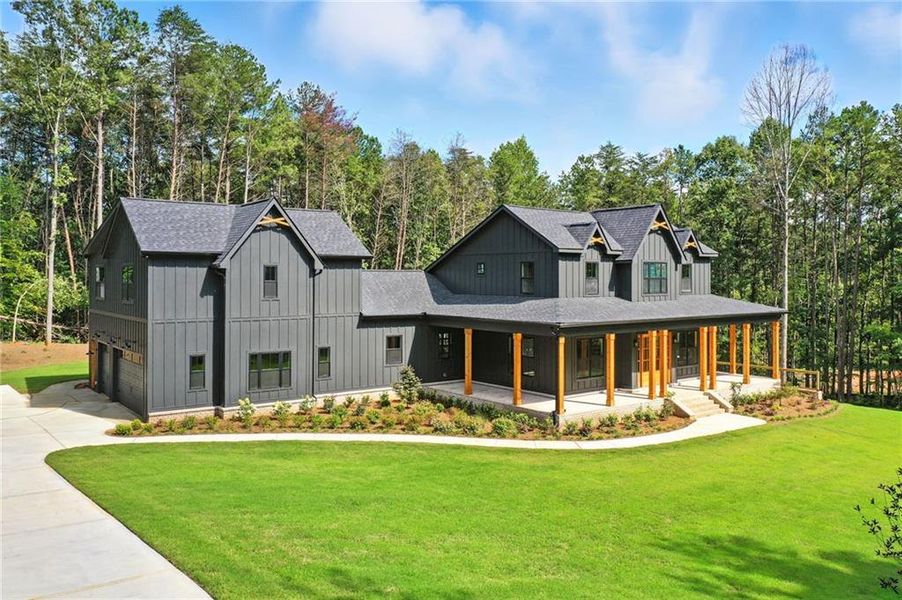 Front exterior of a new home in , Ball Ground, GA, highlighting curb appeal (Image 24).