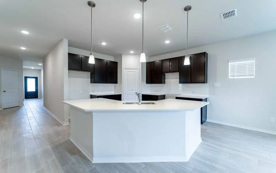Furnished interior view inside a new home in Hunter's Ranch, San Antonio (Image 5).
