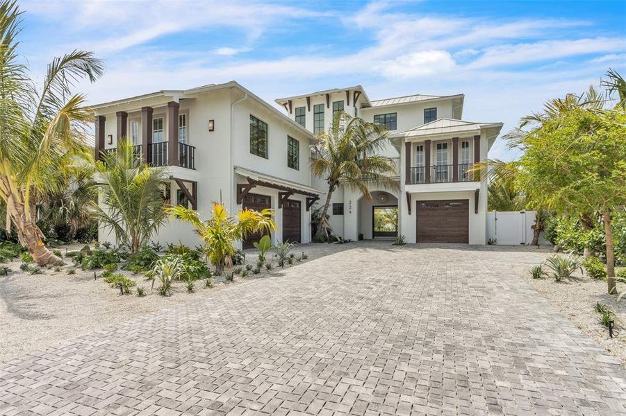 Front exterior of a new home in , Anna Maria, FL, highlighting curb appeal (Image 27).
