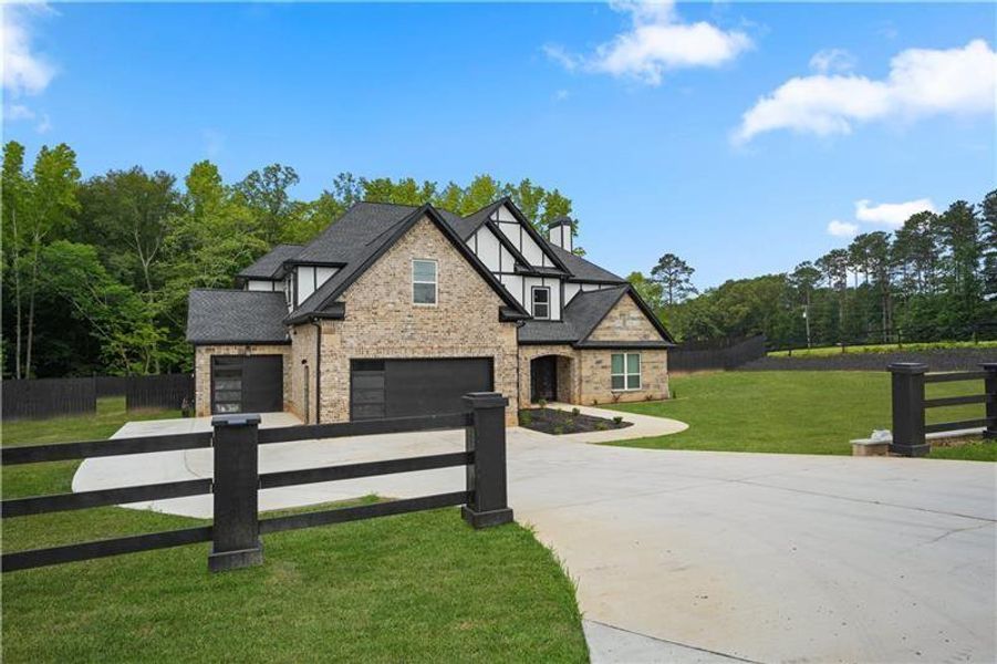 Front exterior of a new home in , Acworth, GA, highlighting curb appeal (Image 26). Front exterior of a new home in , Acworth, GA, highlighting curb appeal (Image 26).