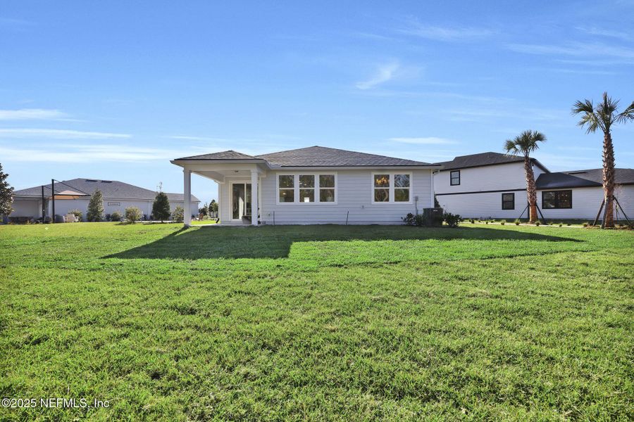 Exterior details and patio area of a home in Murray Farms, Middleburg (Image 40).