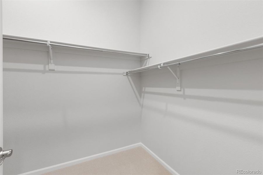 Spacious, unfurnished interior of a new home in The Manors Collection at Golden Overlook, Lakewood (Image 20).