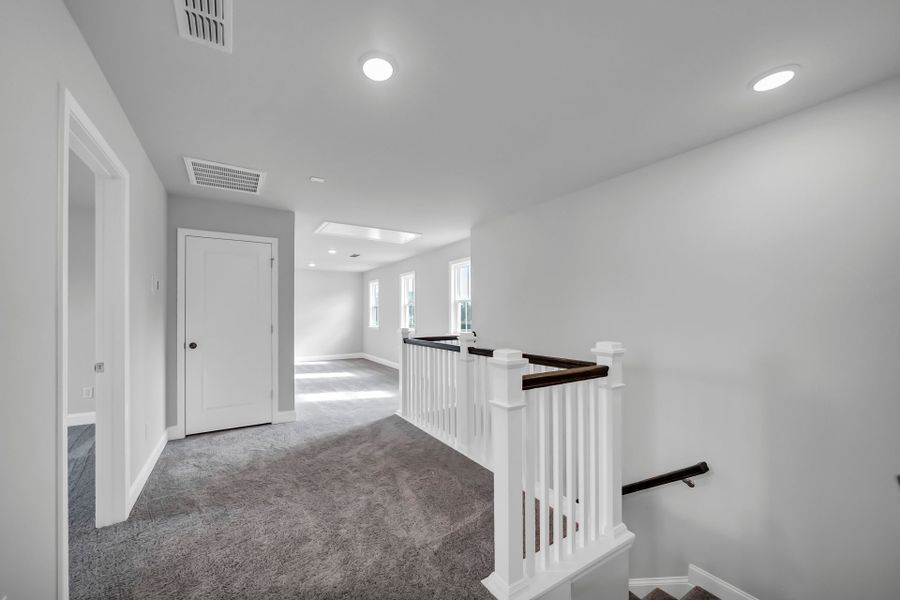 Spacious, unfurnished interior of a new home in Monroe Preserve, Chapin (Image 42).