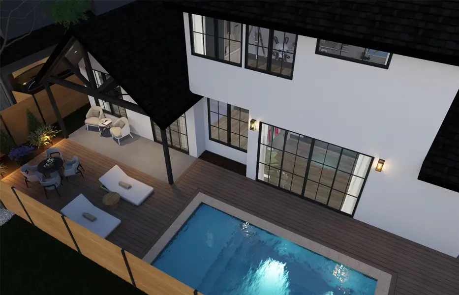 An inviting pool area adjoins the wooden deck of this modern two-story home. An inviting pool area adjoins the wooden deck of this modern two-story home.