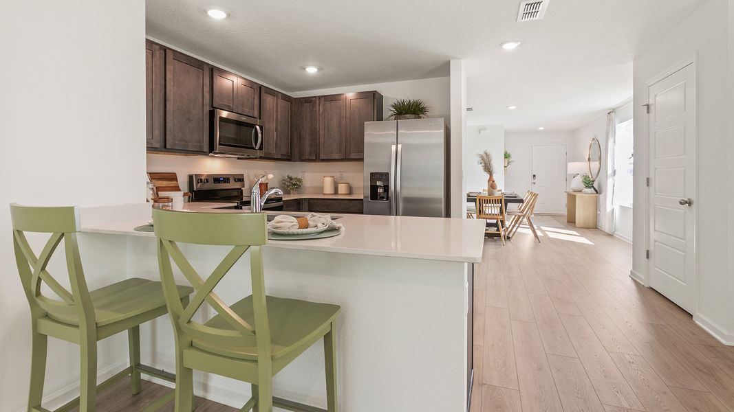 Representative furnished interior of a home built from the ALLEX by D.R. Horton in Copes Landing, Jacksonville (Image 12).