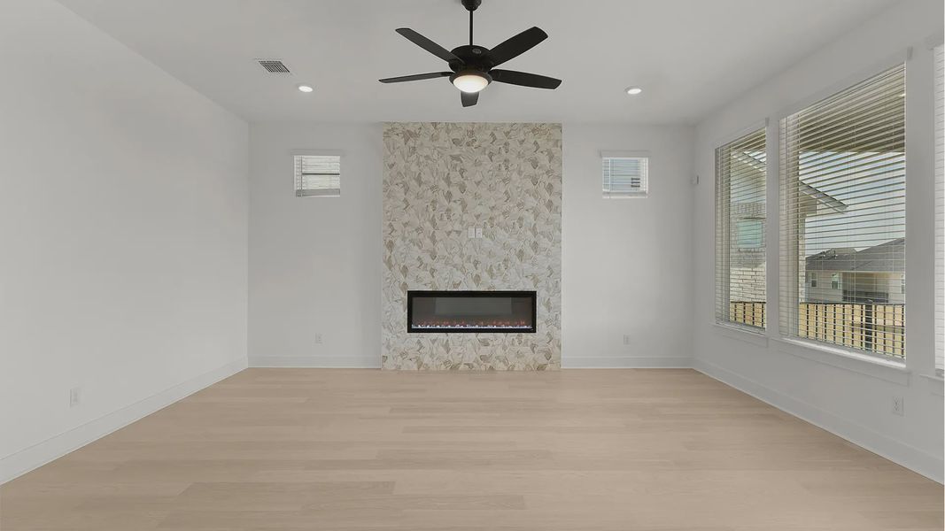 Representative unfurnished interior of a home built from the Cornell by Chesmar Homes in Crescent Bluff, Georgetown (Image 13).