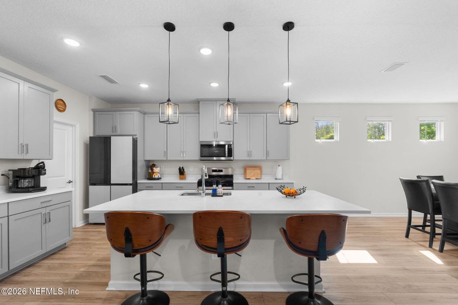 Furnished interior view inside a new home in RiverTown - Settlement, St. Johns (Image 16).