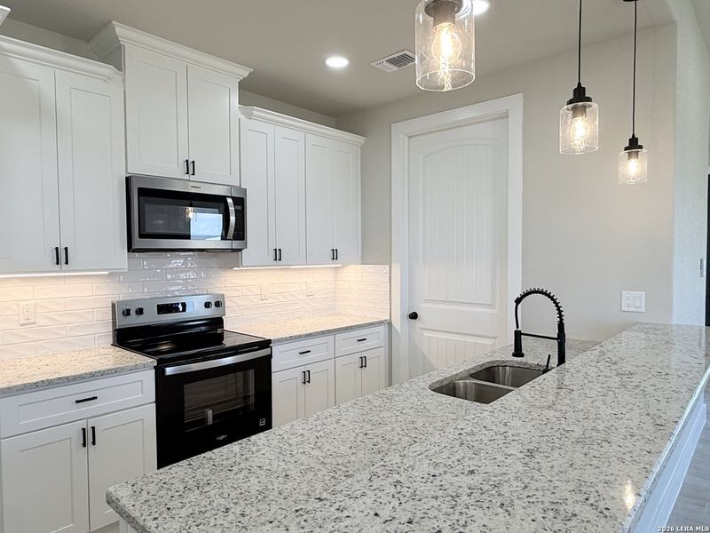 Furnished interior view inside a new home in , La Vernia (Image 13).