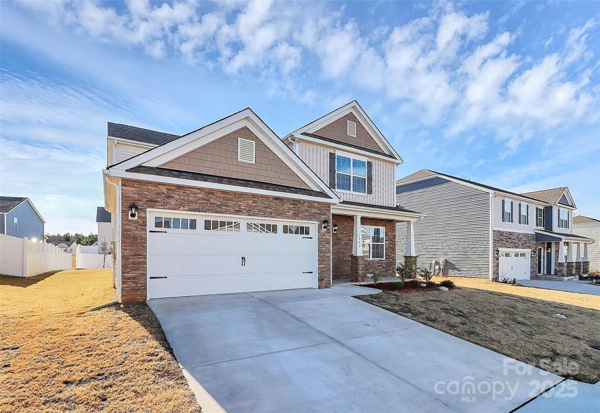 Front exterior of a new home in , Gastonia, NC, highlighting curb appeal (Image 18).