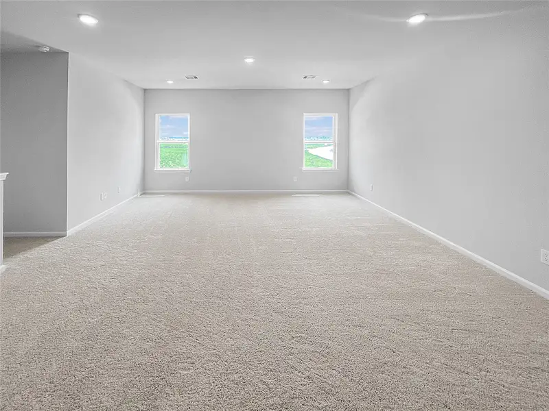 The Waring III- Spacious Game Room/Loft Upstairs. Sample image for illustration; upgrades, options, and colors may vary.