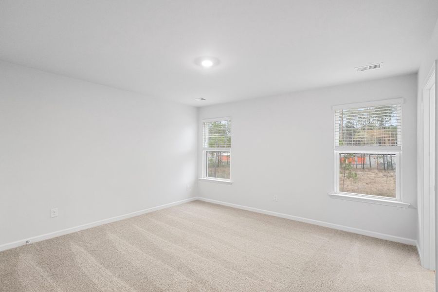 Spacious, unfurnished interior of a new home in The Cove at Mallard Crossing, Summerville (Image 21).
