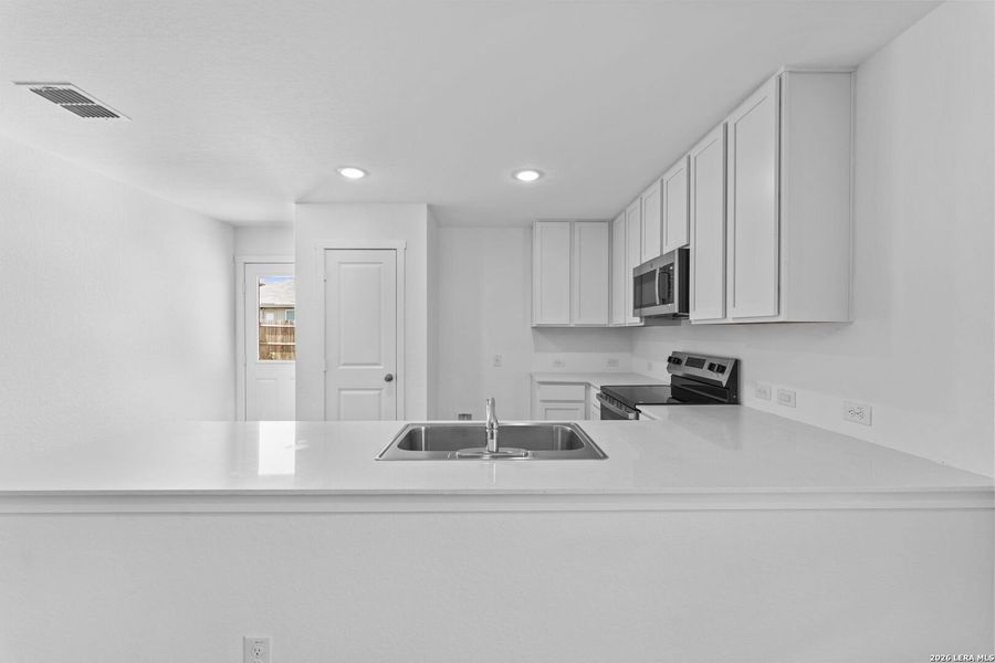 Furnished interior view inside a new home in Higdon Crossing, San Antonio (Image 7).