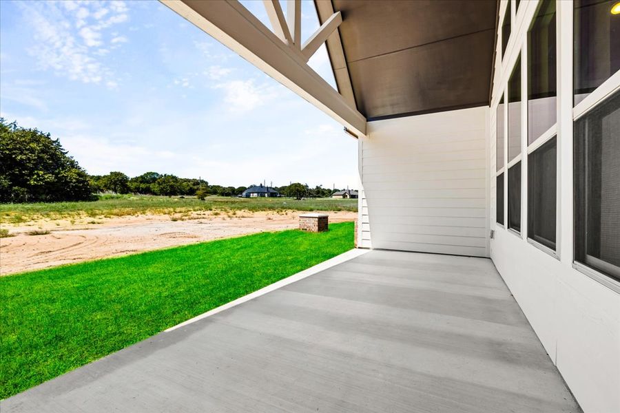 Exterior details and patio area of a home in The Ranches at Valley View, Springtown (Image 3).