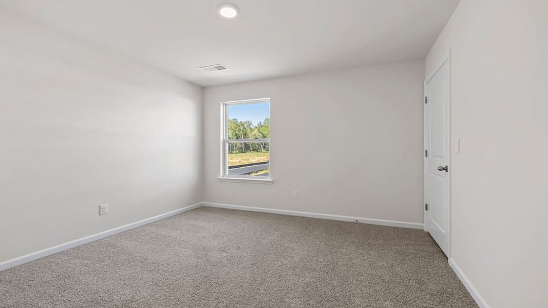 Spacious, unfurnished interior of a new home in Varner Station, Woodruff (Image 24).