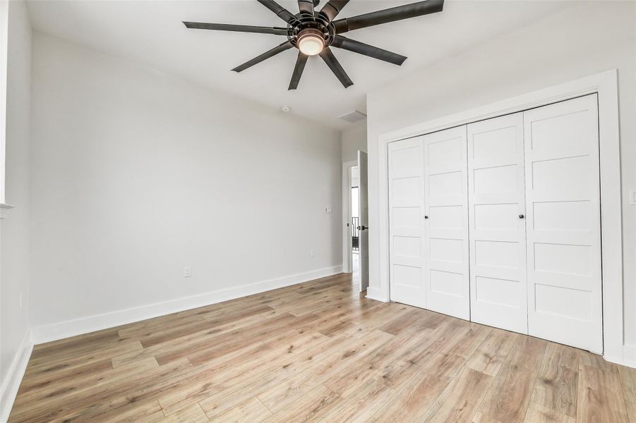 Natural light enhances the warmth and openness of each bedroom. They feel welcoming and versatile.