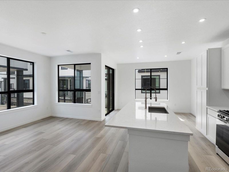 Spacious, unfurnished interior of a new home in The Hub at Virginia Village, Denver (Image 11).