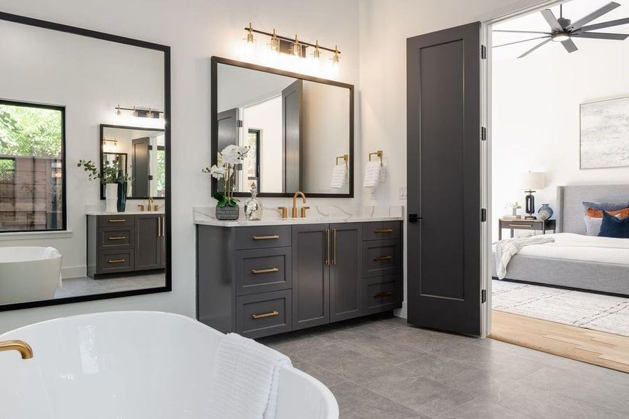 Dual vanities with large dressing mirror